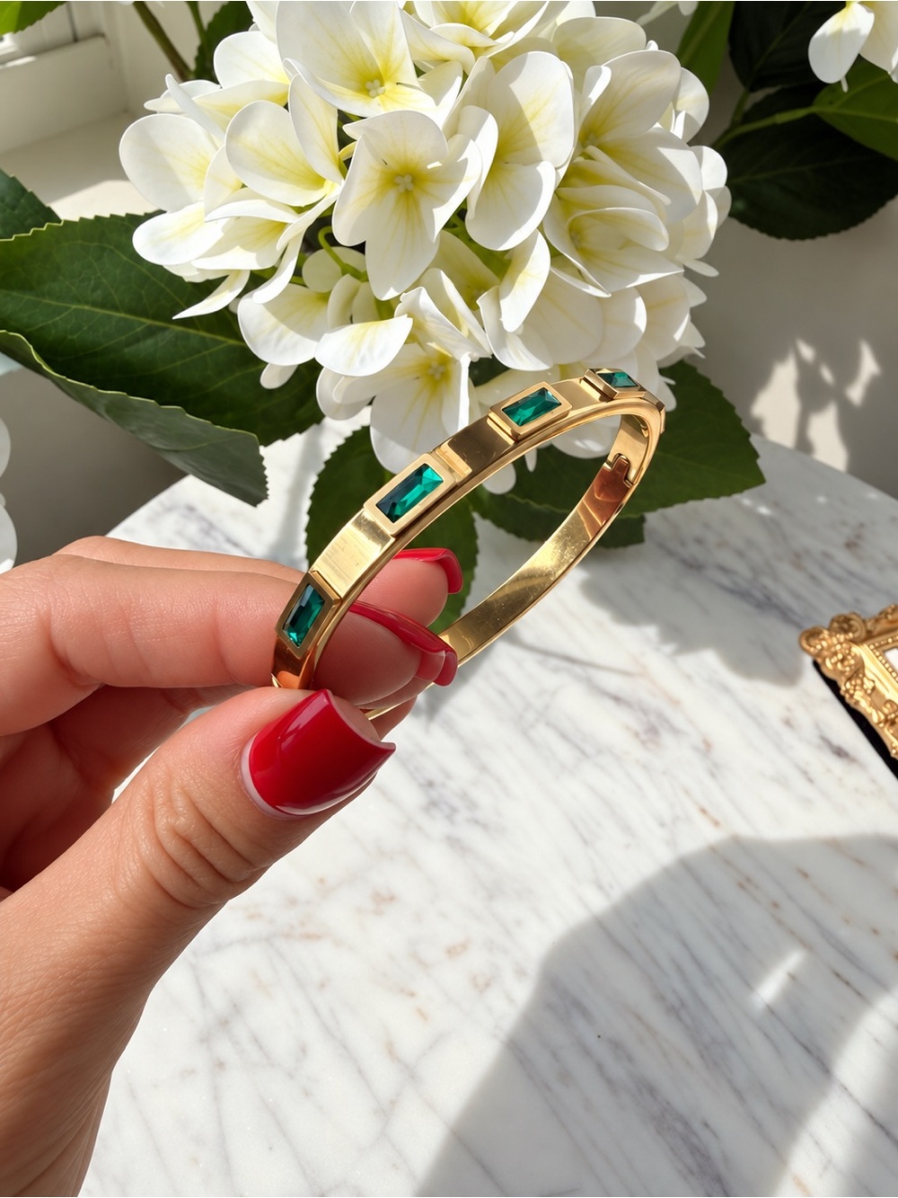 Gold Cuff Bracelet with Emerald Green Stones